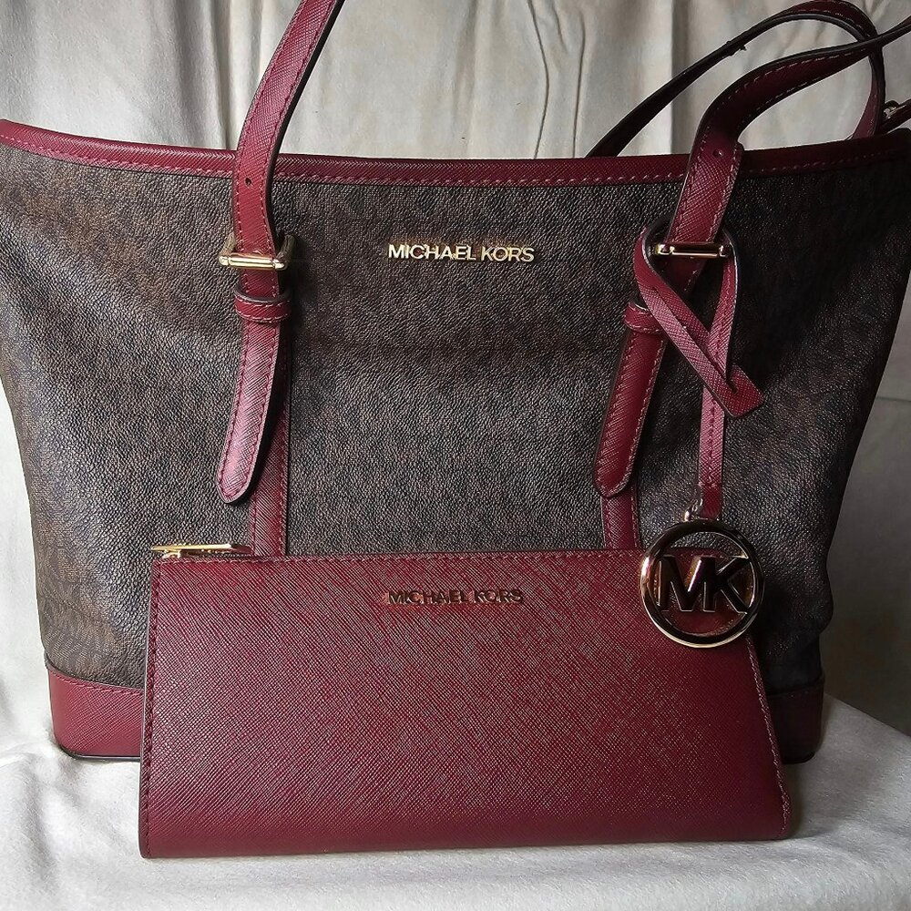 Brand new Michael Kors Tote and matching wallet.